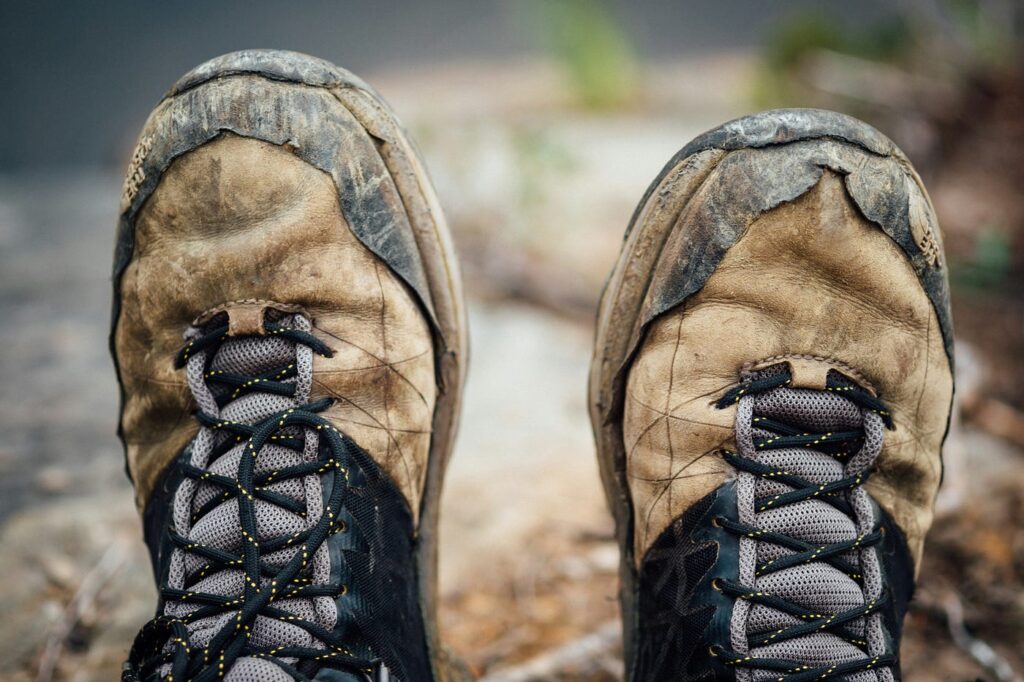 a pair of dirty shoes