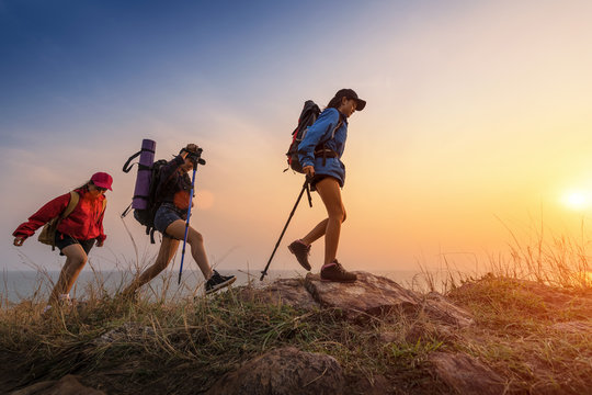 Hikers climbing on mountain